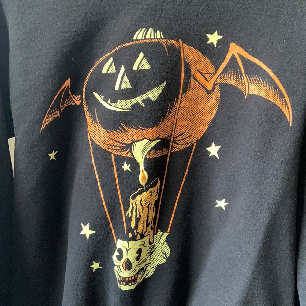 Halloween sweatshirt, flying pumpkin.